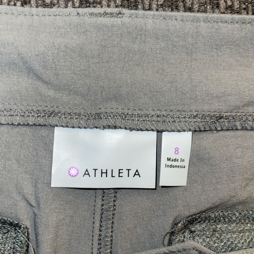 Athleta green shorts with pockets